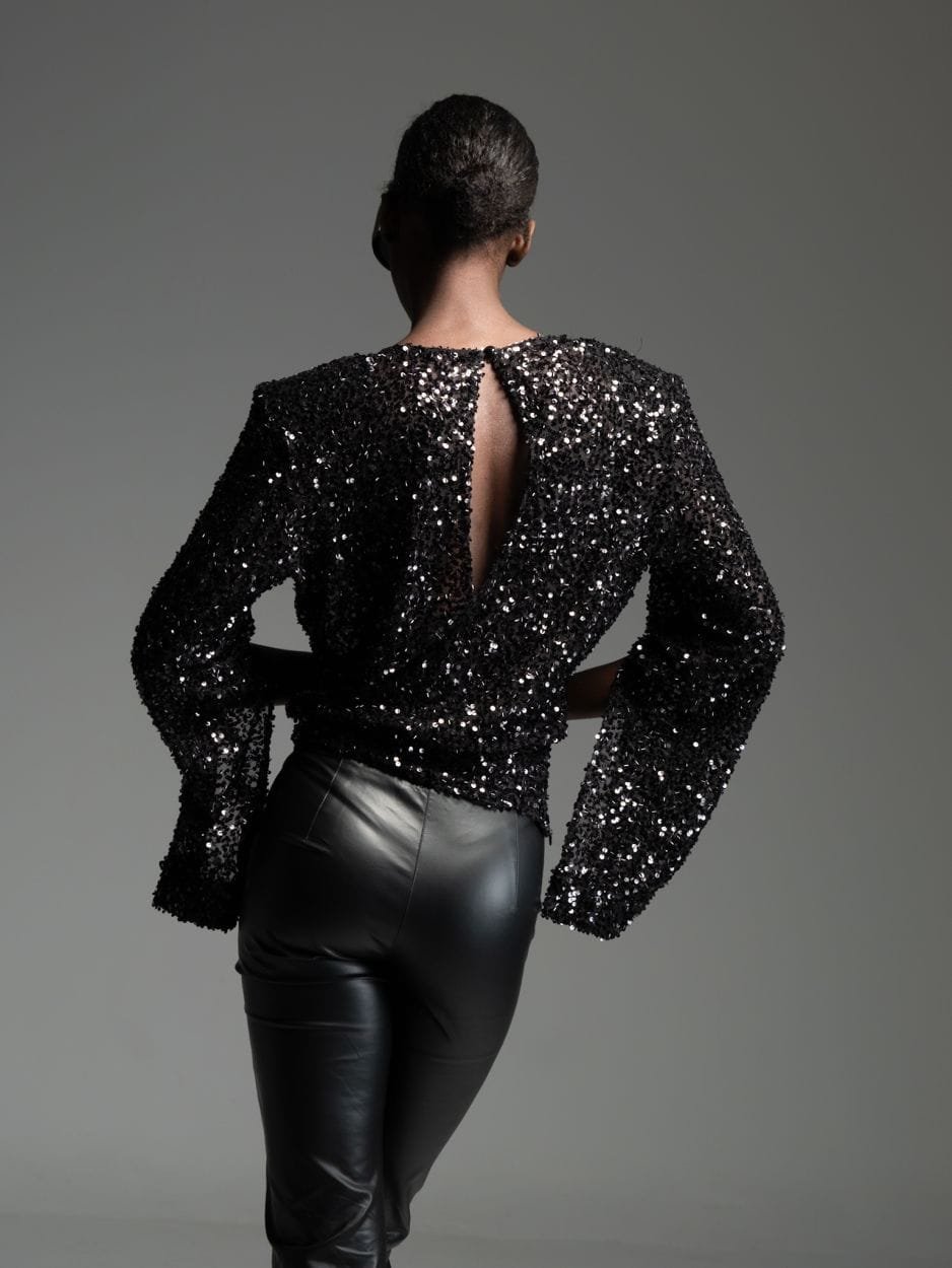 Black sequin top with bold shoulders LUCIEN