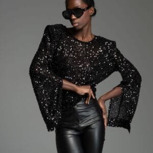 Black sequin top with bold shoulders LUCIEN